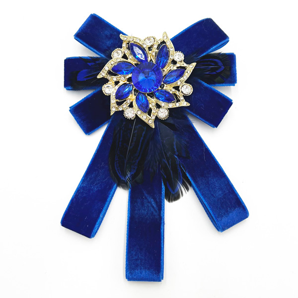 Antique-style tails down bow brooch in blue